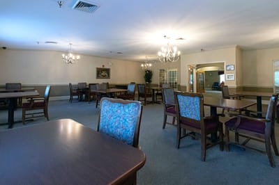Bright dining area with tables and chairs
