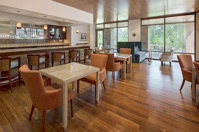 Common area with seating and large windows