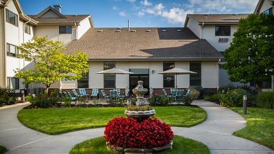 Outdoor garden area with seating and landscaping