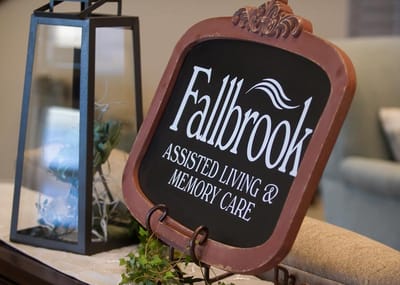 Facility logo displayed on decorative stand