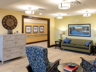 Cozy common area with chairs and artwork