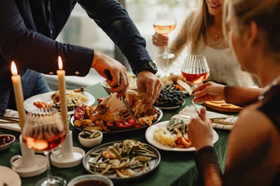 Residents enjoying a festive meal at a dining table