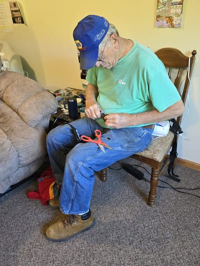 Senior resident engaged in a crafting activity