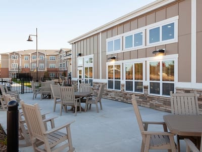 Outdoor seating area next to the facility building