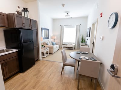 A modern, bright interior of a resident room