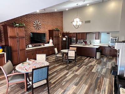 Common area with dining and kitchen space
