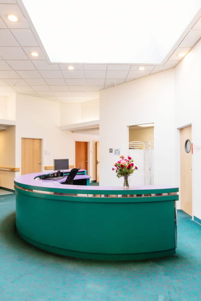 Bright reception area with floral arrangement