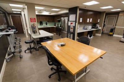 Interior view of a kitchen area with a large table