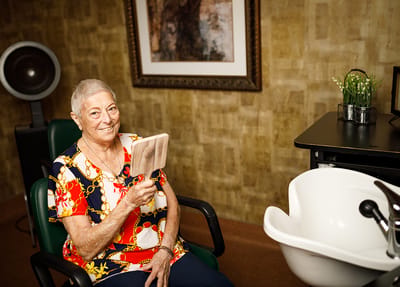 Resident enjoying a beauty treatment at the salon
