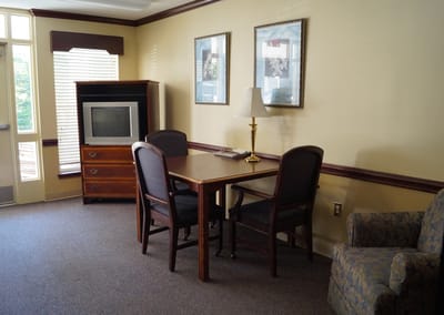 Cozy interior seating area with a table and chairs