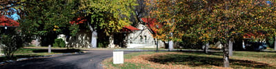 Exterior view of the facility surrounded by trees