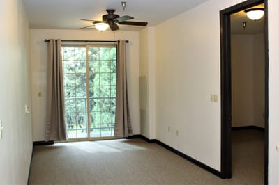Interior view of a room with a balcony door