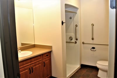 Private bathroom with accessible features.