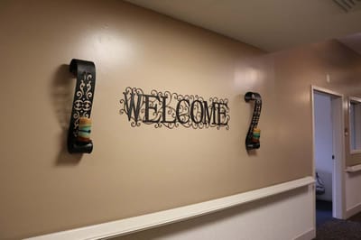 Wall decor with 'WELCOME' sign