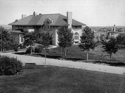 Exterior view of a building surrounded by trees.