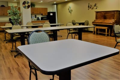 Empty dining area with tables and chairs