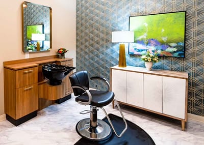 Hair salon setup with modern decor and equipment