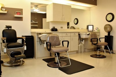 Interior view of a hair salon with styling chairs