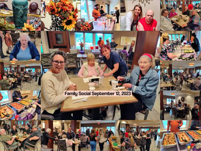 Residents and staff enjoying a social event with food.