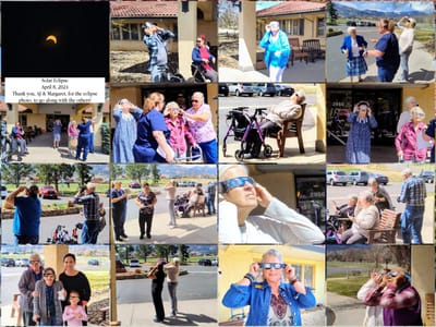 Residents enjoy a solar eclipse viewing event outdoors.