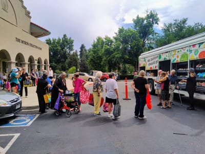 Residents gathering outside the facility for an event.