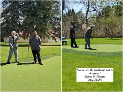 Residents enjoying putting green activity