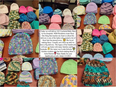 Colorful crocheted baby hats made by residents.