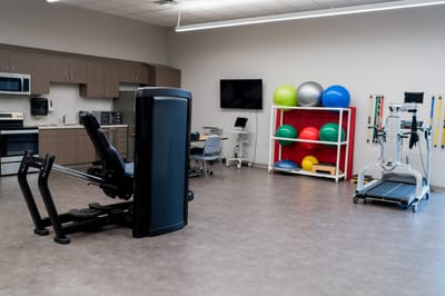 Interior view of a gym with exercise equipment