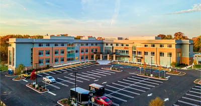 Aerial view of Parker at Monroe building and parking lot.