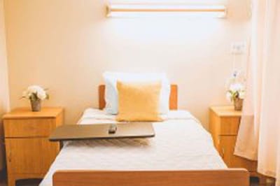 Cozy resident room with a bed and decor