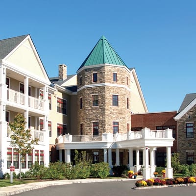 Beautiful exterior view of the facility with gardens