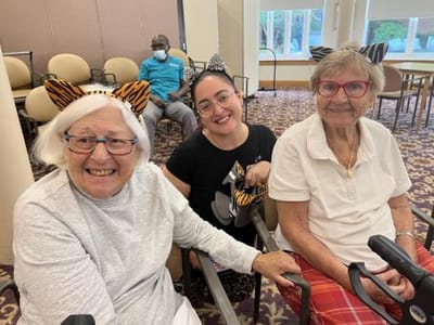 Residents and staff enjoy a fun activity together.