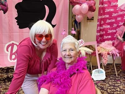 Residents celebrating at a themed event.