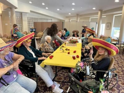 Residents engaged in a craft activity together