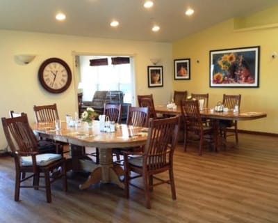 Dining room with wooden tables and chairs