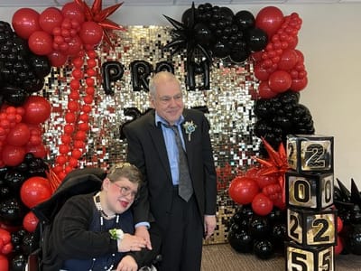 Residents enjoying a prom event with decorations