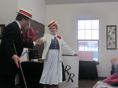 Entertainers performing for residents in a common area.