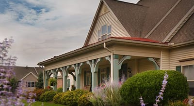 Exterior view of a cottage-style assisted living facility.