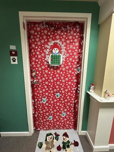 Decorated holiday door on a resident room