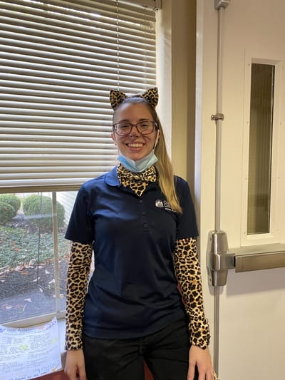Staff member in themed attire at the facility