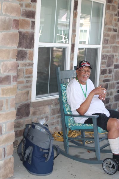 Resident enjoying time on a porch