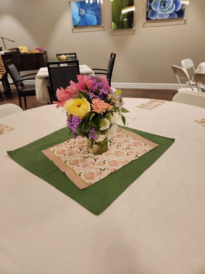 Colorful floral centerpiece on a dining table