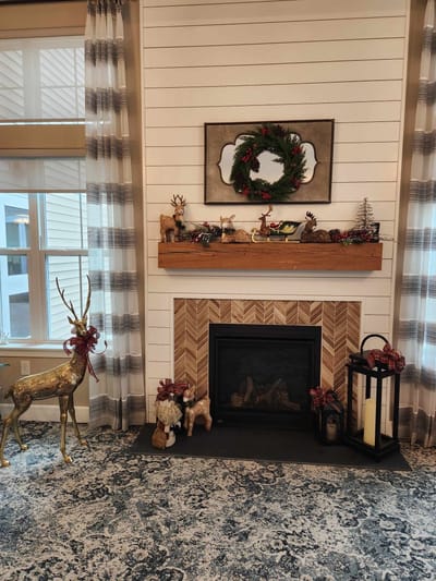 Festively decorated interior with a fireplace