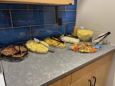 Snack spread in a facility kitchen area.
