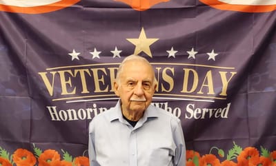 Senior male resident celebrating Veterans Day.