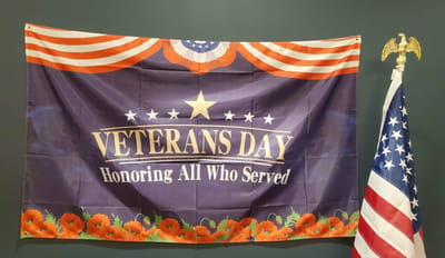 Veterans Day banner in a common area