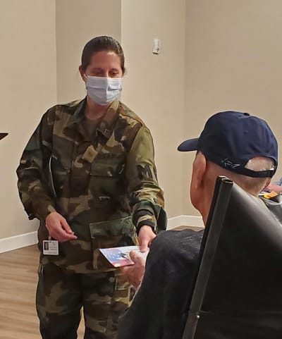 Staff member engaging with a resident