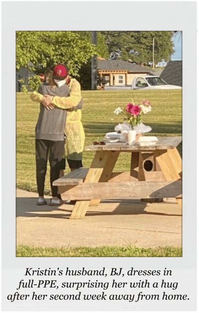 Emotional reunion between husband and wife outdoors.