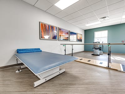 Therapy space with treatment table and art