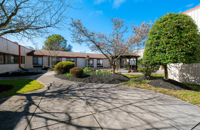 Outdoor courtyard with trees and pathways